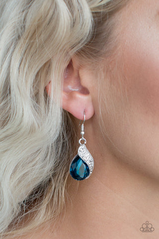 Blue teardrop rhinestone encrusted earring.