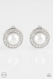 A ring of white rhinestones around a white pearl-drop center clip on earrings